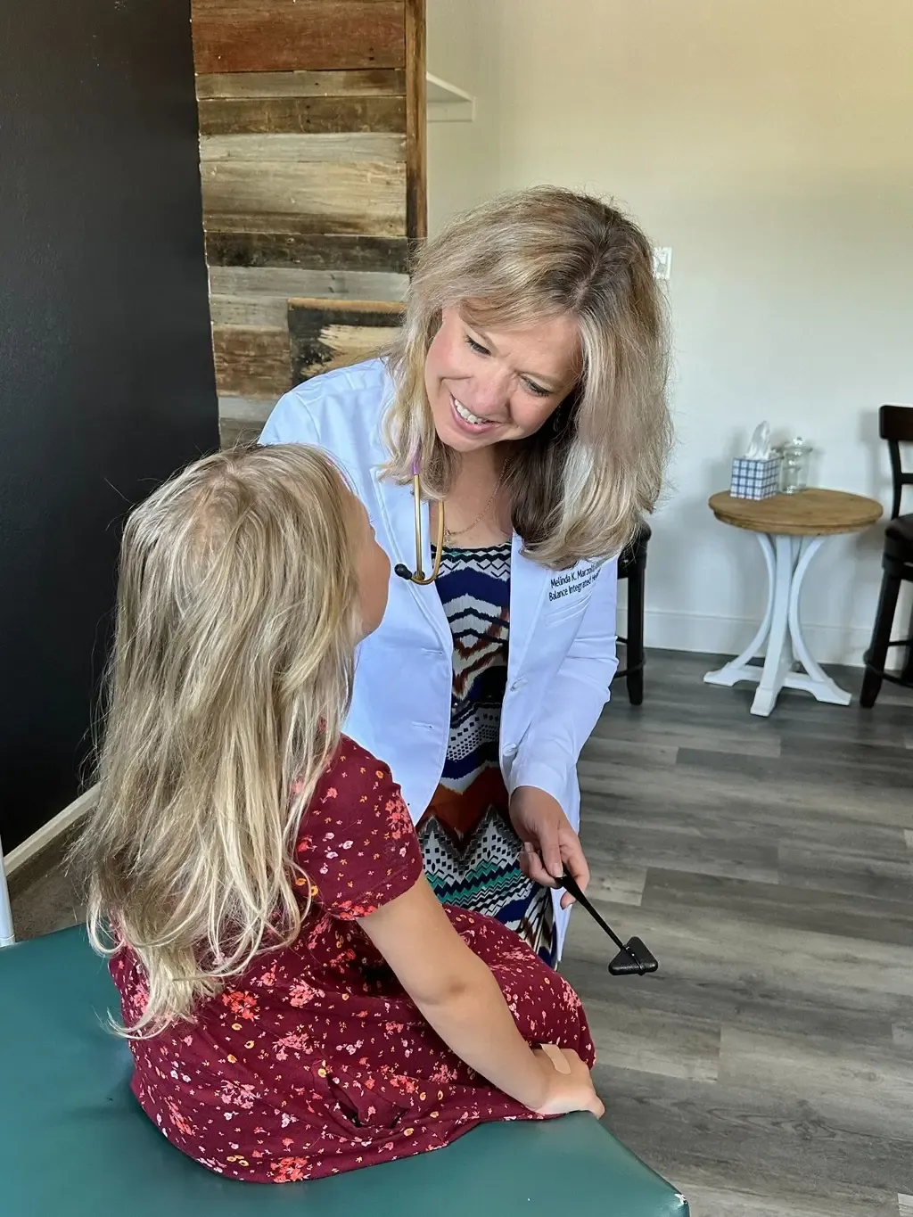Dr. Melinda Marzolf examining a child patient, this is what DPC looks like